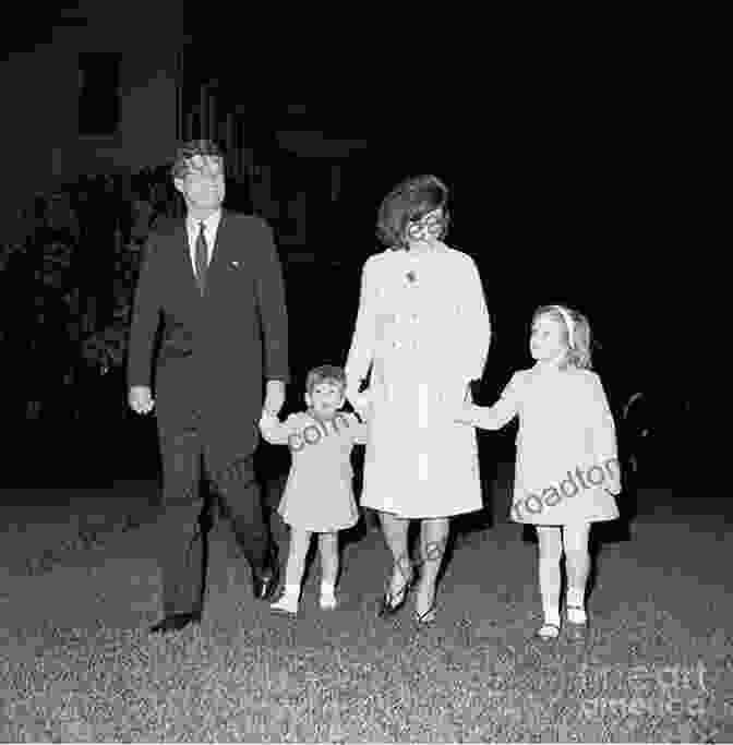 A Candid Photograph Of President Kennedy And His Family Splashing In The Pool At The Little White House, Surrounded By Secret Service Agents. Little White House