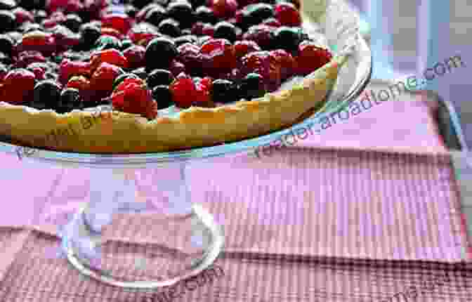 A Delectable Nordic Berries Tart, Showcasing A Vibrant Array Of Fresh And Tart Berries Nordie S At Noon: The Personal Stories Of Four Women Too Young For Breast Cancer