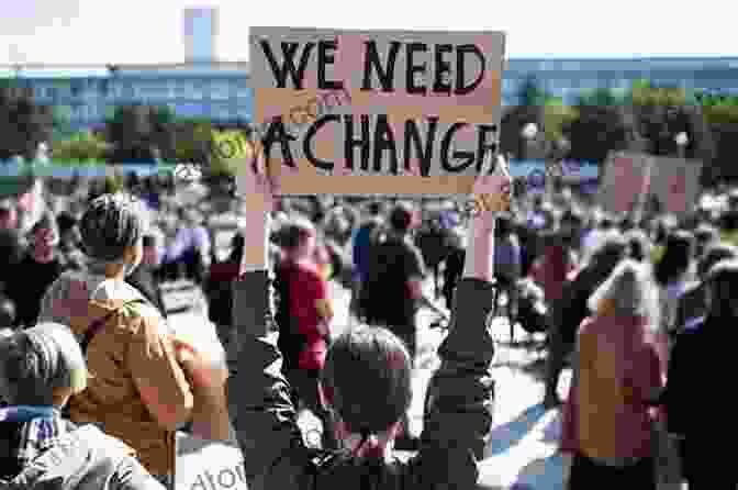 A Group Of People Protesting For A Cause, Demonstrating The Role Of Empowerment In Social Change User Empowerment Design: What Is Empowerment Based On?: Empowerment Design Ideas: What Are The Four Elements Of Empowerment?