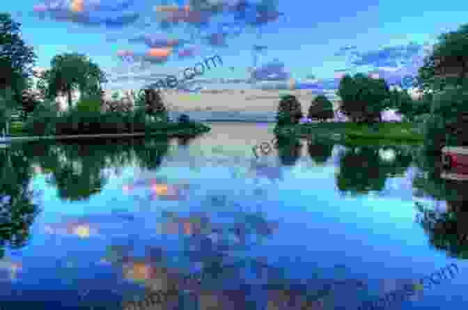 A Serene Landscape With A Tranquil Lake Reflecting The Changing Colors Of The Seasons Creations From The Heart Of Eden