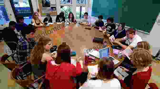 A Vibrant Classroom Scene, With Students Gathered Around Their Teacher As She Reads Aloud From Collins Big Cat Phonics For Letters And Sounds Big Mud Run: Band 02A/Red A: Band 2A/Red A