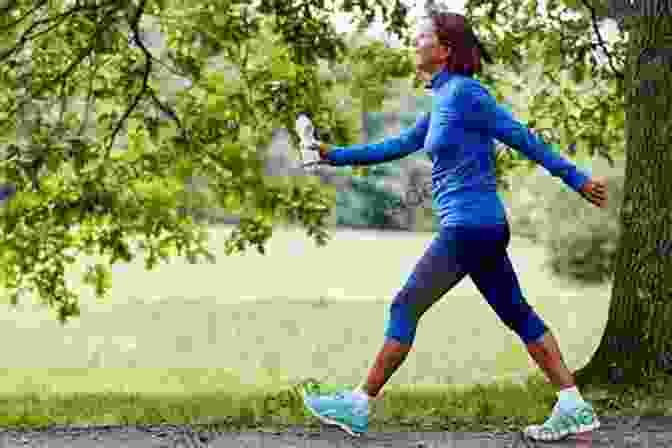 Person Enjoying A Brisk Walk In A Lush Green Park, With A Smile On Their Face And A Sense Of Accomplishment Dropping Weight By Walking: The Power Of Walking