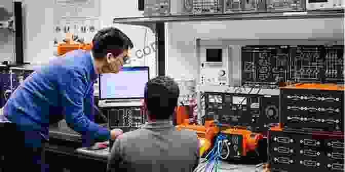 Photo Of Computer Engineers Working On A Project, Illustrating The Practical Applications Of Computer And System Engineering Telecommunications Engineering: Establish Telecommunications Facilities: Computer Engineering And System Engineerin